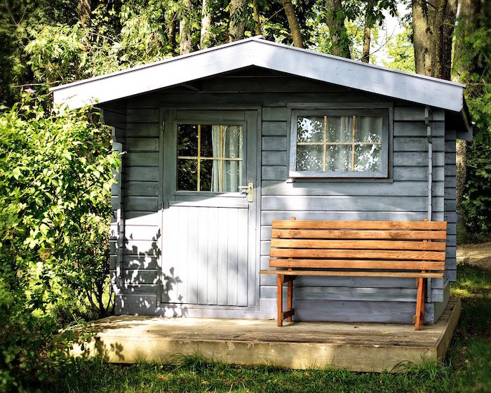 Casita para jardín con sistema de canalones